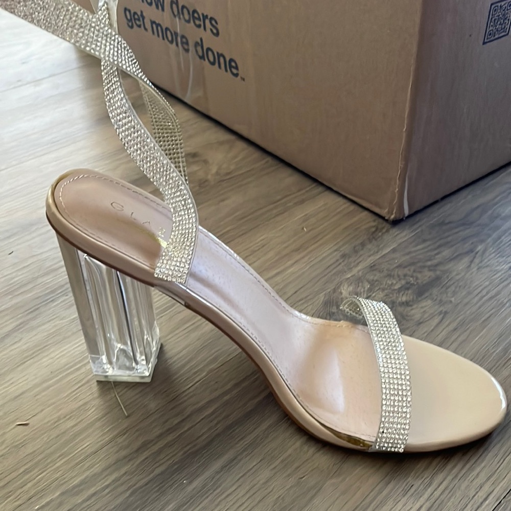 worn clear diamond heels , wraps up ankle !